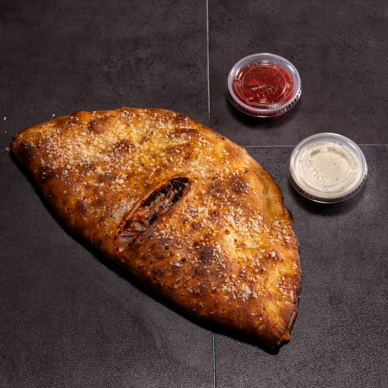 Indulge in Our Calzone